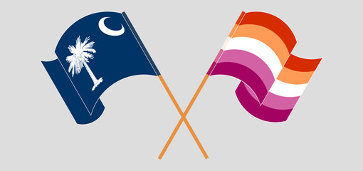Crossed and waving flags of The State of South Carolina and Lesbian Pride