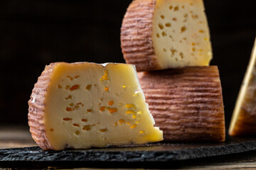 Group of Natural mountain cheeses made in the traditional Craft cheese from cows and goats milk