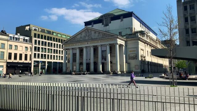 People hanging out nearby the royal. theater in Bruxelles