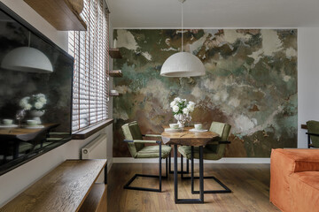 Modern Japandi interior design appartment in earth tones, natural textures with wooden solid oak furniture and clay textuted wall. Japandi concept