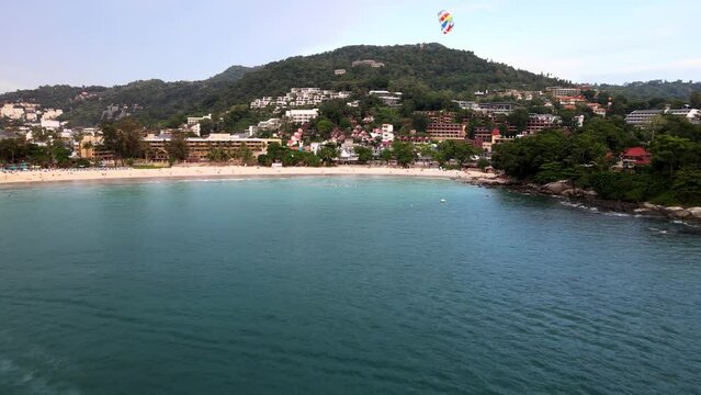 Aerial View Of Parasailer Over Kata Beach In Phuket. Dolly Forward 