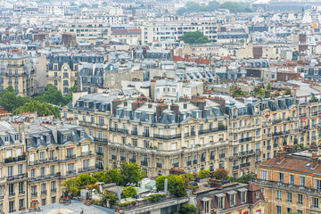 Fototapeta na wymiar Typical Parisian Haussmannian residential building in Paris, France