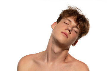 Naklejka premium Male beauty. Studio shot of young handsome man isolated on white studio background. Concept of men's health, antiage, self-care, body and skin care.