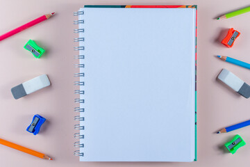 Top view of a set of school supplies with copy space.