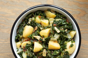 Blitva traditional homestyle south Croatia dish made with boiled potatoes, swiss chard, garlic and...