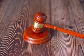 A court judge hammer on a wooden table. Concept for decisions, judgments and courts. Copy Space