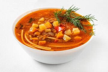 Italian minestrone soup on white