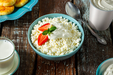 Cottage cheese with raspberries and blueberries, strawberries and mint