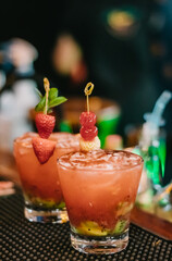 Luxury drink served with strawberries and cherries in exquisite Brazilian Pub beach