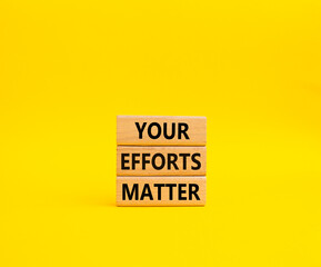 Your Effort Matter symbol. Wooden blocks with words Your Effort Matter. Beautiful yellow background. Business and Your Effort Matter concept. Copy space.