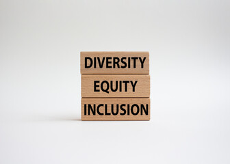 Diversity Equity Inclusion symbol. Concept words Diversity Equity Inclusion on wooden blocks. Beautiful white background. Business and Diversity Equity Inclusion concept. Copy space