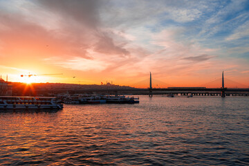 Fototapeta na wymiar Boats in sea and scenic sunset in Istanbul
