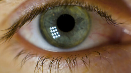 Extreme Macro of a brown eye. Video. Closeup of man's eye. spot in the eye. macro. High dynamic range and macro shot hazel eye
