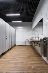 New public toilets partitioned into rooms and sinks