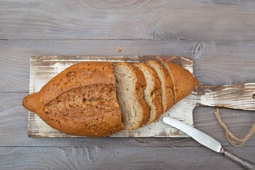 Sliced rye bread with cereals. The concept of reducing bread production. The global food crisis due to interruptions in grain supplies. The threat of famine