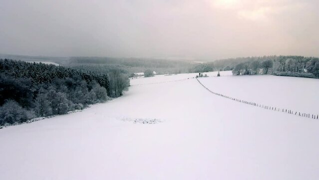 Snowy Winterberg Schwelm Droneshot to the valley