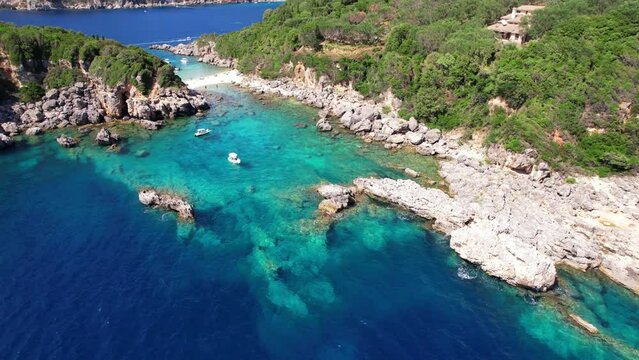 Corfu island, Greece Aerial drone video of beautiful double beach with turquoise clear waters Limni beach Glyko near Paleokastritsa 