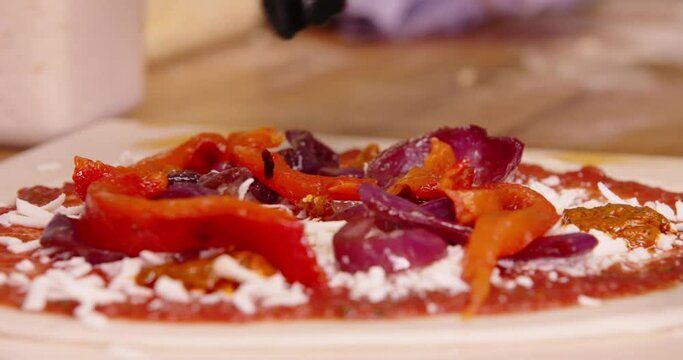 Making fresh pizza peppers and caramelized caramelised onions