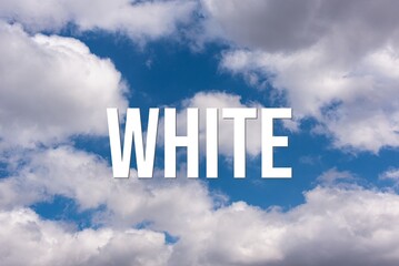 WHITE - word on the background of the sky with clouds.