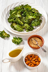 white plate with kale chips on the table