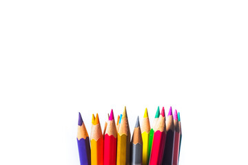 Color pencils on white background with copyspace. Color pencils for school or professional use. picture for school background There is space for content.