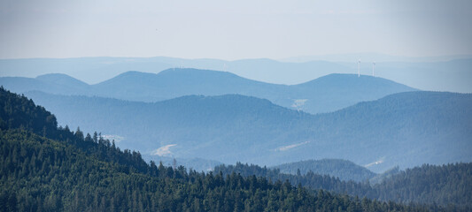 Amazing mystical rising fog mountains sky forest trees landscape view in black forest ( Schwarzwald ) winter, Germany panorama panoramic banner - mystical snow foggy mood..