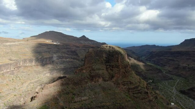 Wonderful aerial elevation shot near of the Ansite Fortress on the island of Gran Canaria. Ancient aboriginal caves are found inside.