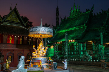 Illuminated Ganesha and Buddhist silver temple