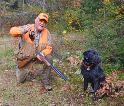 Hunter with his Lab and a woodcock