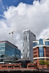 Construction work with large cranes and buildings. Taken in Salford Quays England. 