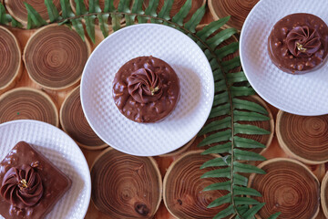 three servings of chocolate cake. chocolate cake. sweets