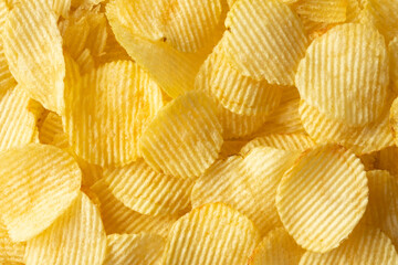 crispy golden potato chips snack texture background