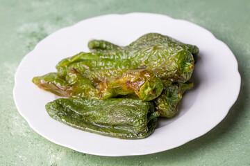 Traditional delicious Turkish food, fried pepper, roasted pepper, (Turkish name; biber kizartmasi, kizarmis biber)