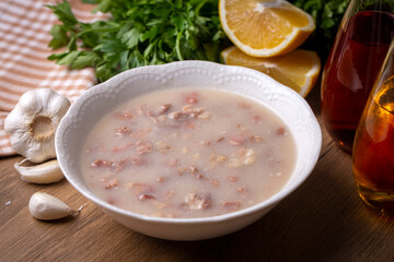 Traditional delicious Turkish food, Turkish traditional tripe soup; iskembe corbasi and offal soup, Turkish Meat Soup Kelle Paca (Turkish name; Kelle paca corbasi)