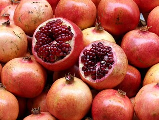Italy, Sicily: Pomegranate at market.