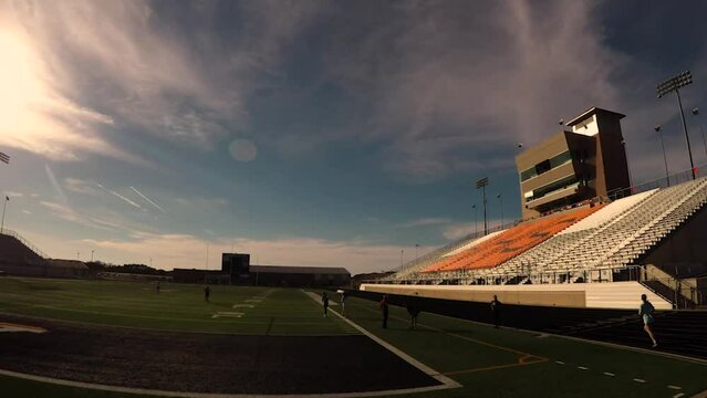 Timelapse of Texas High School Football field Stadium at sunset