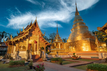 Fototapeta na wymiar Phra Sing temple,landmark for tourist at Chiang Mai,Thailand.Most favorite landmark for travel Phra Sing temple at night scene.