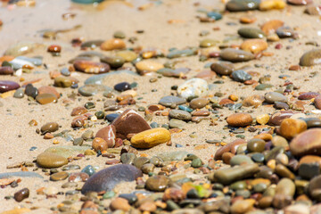 Pebble beach in Jijel city, Algeria. Summer vacation concept.