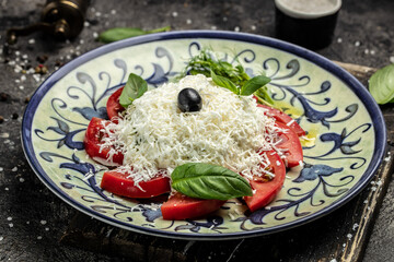 Fresh greek feta cheese salad served with tomatoes, Restaurant menu, dieting, cookbook recipe top view