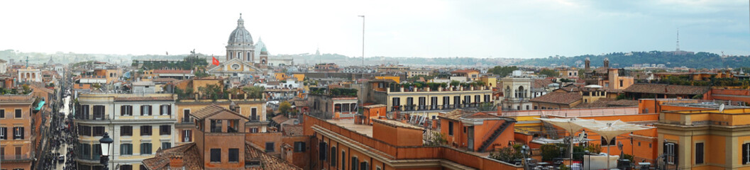Fototapeta na wymiar Panoramic view of Rome, Italy, Europe. Header with old Roma city for web. Beautiful Rome skyline in summer. Wide panorama of Rome against mountain. Nice scenery of Rome, cityscape of historical town.