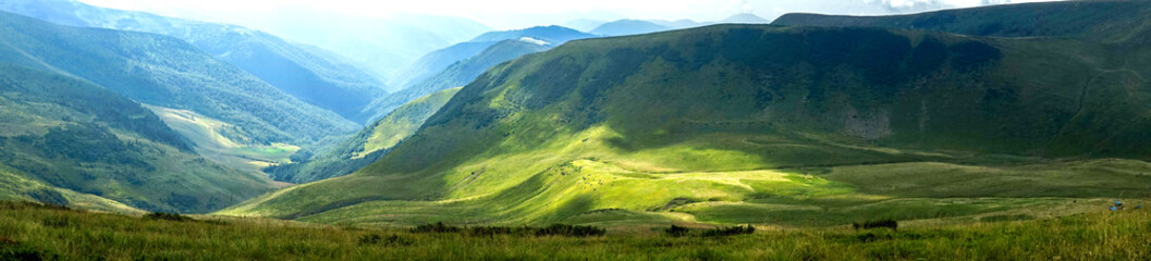 Panoramic view of the Carpathian mountains on a sunny day, Ukraine - 515445368