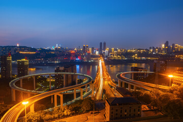Fototapeta na wymiar At night, the circular overpass and the urban skyline are in Chongqing, China