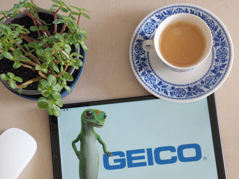 In this photo illustration GEICO (Government Employees Insurance Company) logo seen displayed on a tablet