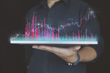 Growing graph of Business on visual screen, business people analysis business data and economic growth with financial graph, technology digital marketing and global economy network connection.