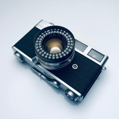 Vintage analog camera on isolated light background | object