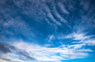 Naklejka na ściany i meble Highly detailed blue cloudy sky background