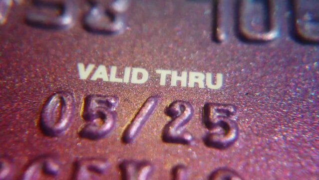 Qawra, Malta 07.05.202 - Valid thru on the credit card. Macro shot. High quality 4k footage