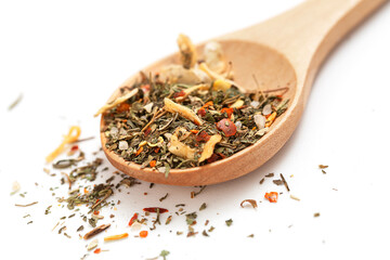 Greek spices mix in wooden spoon