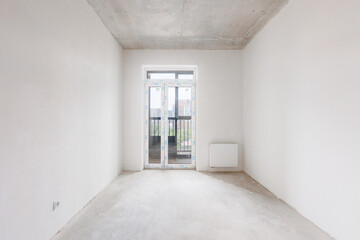 interior of the apartment without decoration in gray colors. rough finish