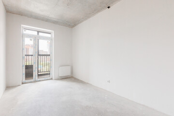 interior of the apartment without decoration in gray colors. rough finish